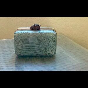 House of Harlow light blue clutch, in great condition.